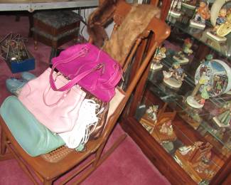 Steffans rocker with purses and furs