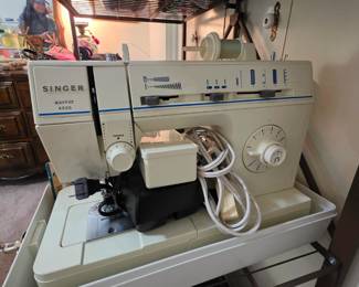 vintage Singer sewing machine, lots of sewing notions