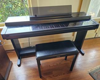 9 YamahaClarinovaElectricPianoWithBench