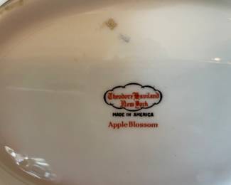 Many, many pieces of Apple Blossom china.  A classic pattern.
