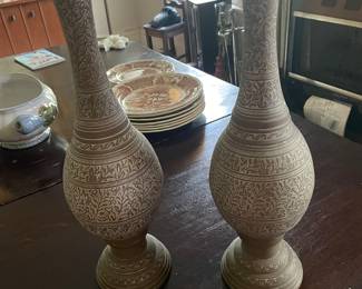Metal engraved vases.
