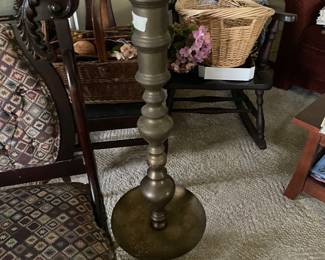 Tall brass candle holder. Comes apart to make it shorter.