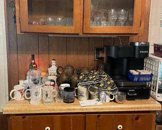 Mugs, glassware, coffee maker