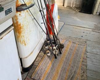 Vintage fishing rods and reels.