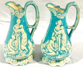 9776 - 2 Pottery Pitchers - 7.5" Tall