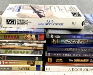 4244 - Lot of Assorted DVD & VHS Tapes