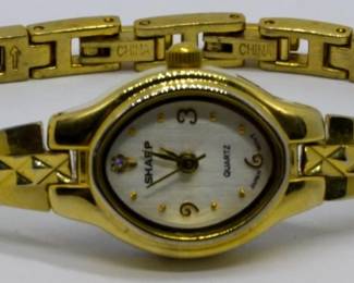 507 - Sharp Quartz Watch You are buying a used as-is electric/electronic item. We do not guarantee all components are present, and if it is not expressly stated, it is untested.