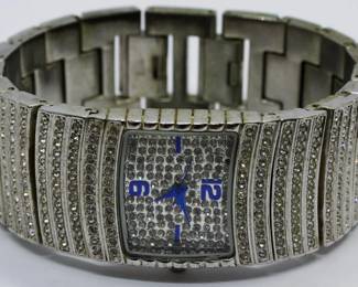 506 - Adrienne Watch You are buying a used as-is electric/electronic item. We do not guarantee all components are present, and if it is not expressly stated, it is untested.