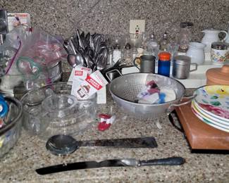 Kitchen: desert plates, serving bowls, ramekins, creamers, salt/peppers, salt platter, and flatware sets
