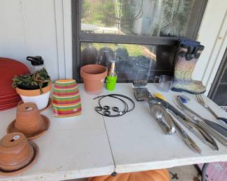 Planters, garden boots and grill tools
