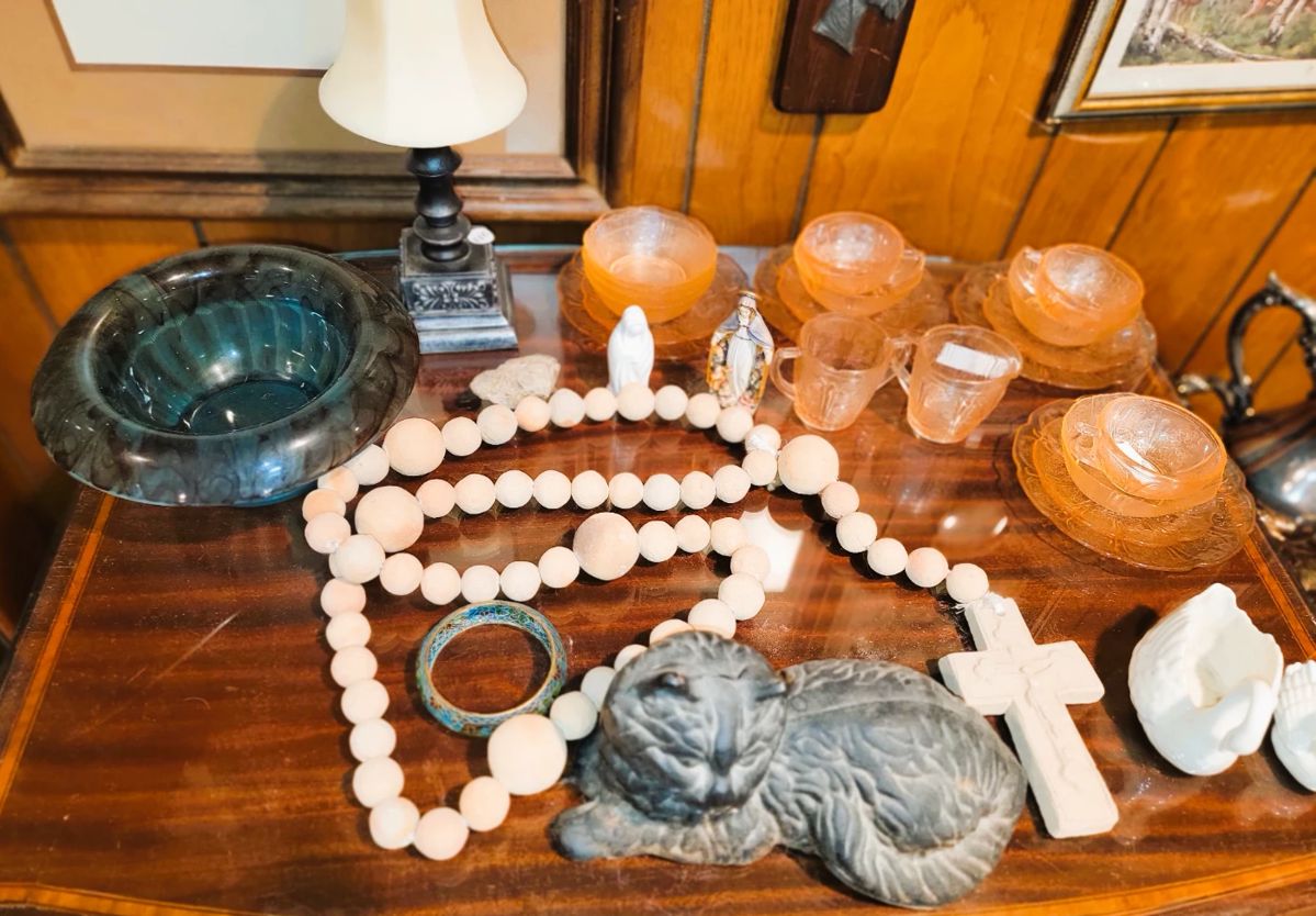Home Decor: Pink Glass, Pottery, oversized rosary and iron cat