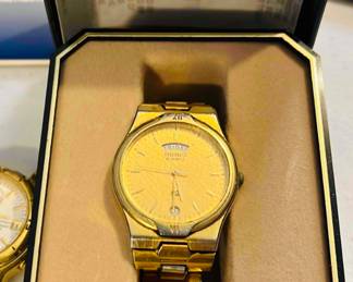 This is a Seiko 5Y23-8040 quartz watch with a gold finish, purchased in 2001 with original store receipt