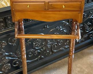 Mid Century walnut gentlemen's valet stand with drawers. 1950’s Features a shelf for cufflinks or jewelry and bars for hanging clothes the handles of the two small drawers are made of brass. Dimensions 20.47”Wx18.9Dx48.82H