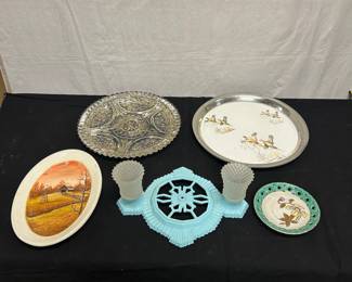 Collection of plates, platters and candle holder.