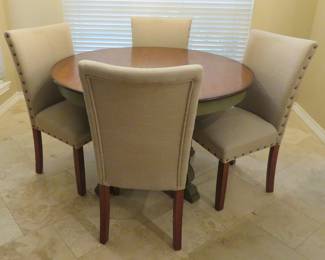 Round dining table with chairs
