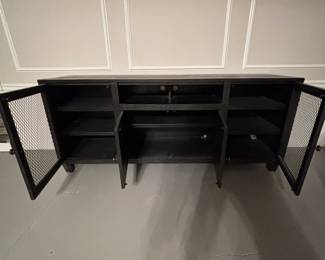 Entertainment Center
Black Wood with metal screen type doors to keep your equipment from over heating. This furniture is brand new and has never been used.
Dimensions: 72” Wide, 18” Deep, 30.5” Height. End shelves are 19” wide and the middle shelves are 29.5”
Condition: New $300