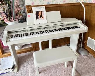 Yamaha Clavinova CVP-87A Digital Piano. The best for both beginners and experts. Includes bench and books. Never needs tuning.