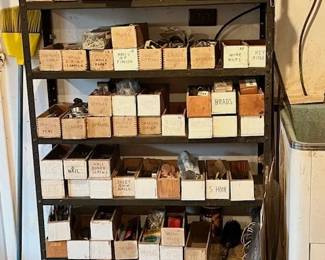 Hardware, misc parts in labeled cheese boxes.