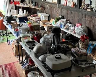 Christmas decor, lots of appliances, sports equipment, stereos, Snow Village, CDs-VHS tapes