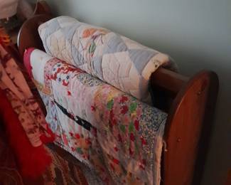 Quilt rack, vintage quilts
