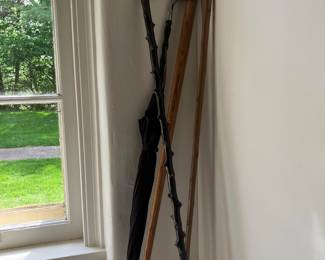 Several antique canes, umbrellas