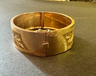 Detail of the Safety Lock and Opening Mechanism on the 18K Gold Bangle.