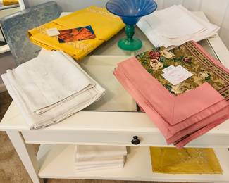 Additional View of the Amazing Hand Made Italian Bed Linens Available Shown on a White Coffee Table with Glass Top and Pull Out Shelf, 36.5" x 36.5"D x 19.5"H.