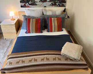 Full Sized/Queen Bed Frame and Mattress Shown with Unbelievable Bedding and Art.