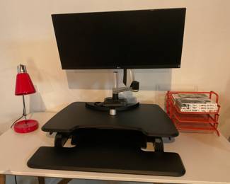 Oversized LG 29" Flat Monitor Model 2W29500 with Adjustable Tilting Stand shown on a Heavy Duty Vari Desk Essential 30 Adjustable Height Work Converter.