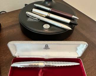 Detailed View of a Sample of the Fine Pens Available including Montblanc Meisterstuck Silver Solitaire Pinstripe 144 Rollerball Pen, Sterling Silver Ballpoint Pen Made in Germany, "Spacepen" by Fisher and More!