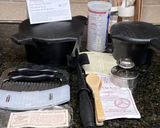 An Assortment of Pampered Chef Items, Also Have 3 Stoneware Trays