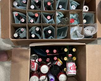 Assortment of Coca~Cola Bottles and Other Items