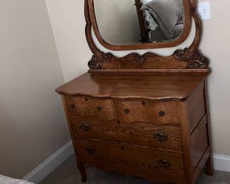Oak Dresser w/Oxen Yoke Mirror,
And Two Serpentine Top Drawers and
two Standard Drawers