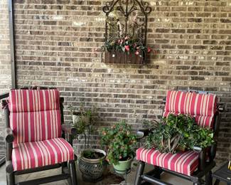 Outdoor rocking chairs and decorative iron wall planter