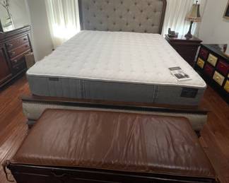 Cherry wood and tufted king headboard and frame with Stearns and Foster mattress and box springs