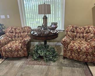 Pair of tufted back upholstered chairs by Key City, mahogany drum table