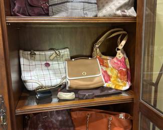 Coach, Dooney and Burke, Ralph Lauren and Michael Kors hand bags
