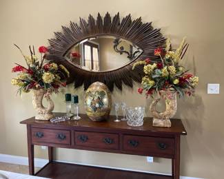 console table, pair of arrangements, large "eye mirror", large Satsuma porcelain hand painted egg, assorted crystal