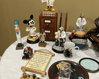 assorted doctor figurines, etc