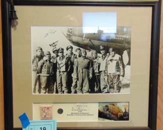 Lot 019 framed photo of "Memphis Belle signed by some crew members.
