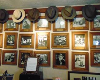 Lot 110 photo of FDR life and career with metal plaques and hats (not originals) sold separately.