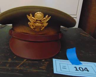 Lot 104 USAAF officers' hat, 1944, signed by Lt. Col. Fred Olivi.