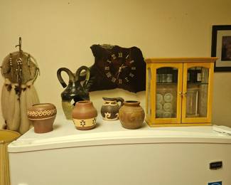 Studio pottery, essential oils cabinet, dreamcatcher, wood slab clock