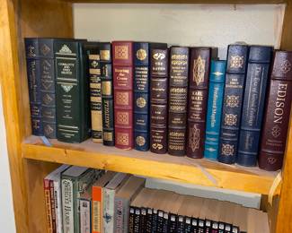 Floor to ceiling shelves full of amazing books
