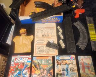Vintage Tyco command control train track, Wizards of Oz Lion puppet, vintage child rearing paperback, comic books