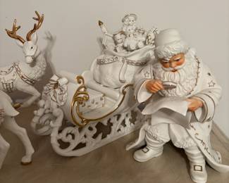 White Santa Claus and Sleigh with Reindeer Figurines