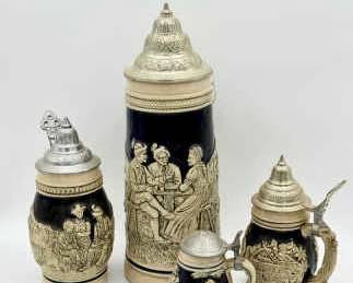(4) German Relief Beer Steins with Pewter Lids – DBGM Marked