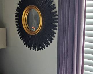 *Black and gold sunburst mirror
