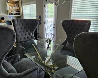 *4 Gray highback wing chairs
*Rectangle Dinette table with gold 
  legs