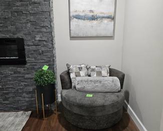 *2 Oversized gray swivel chairs 